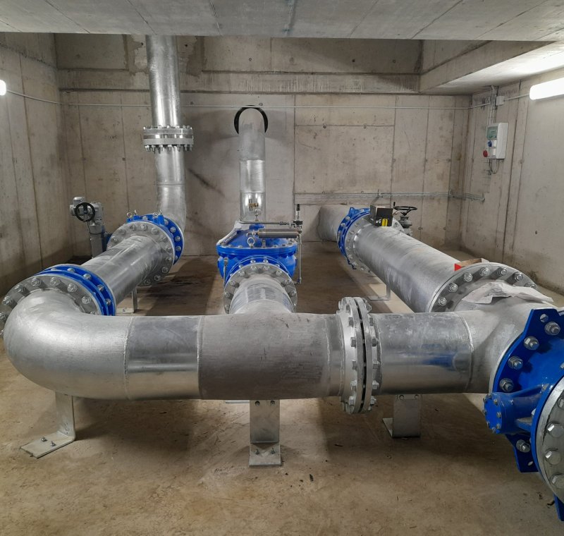 Wasserkraftwerk Konfall und Beregnung Schludernser Ebene